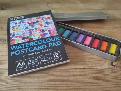 Watercolour paints and postcard watercolour pad