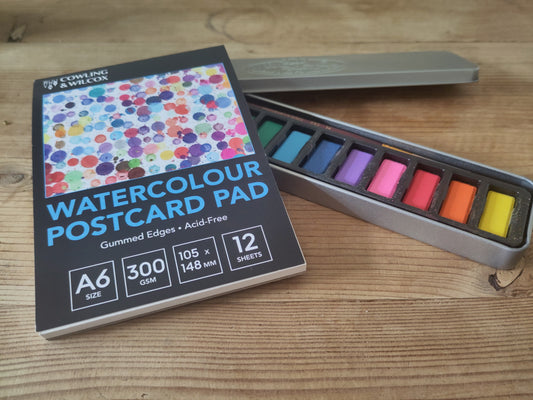 Watercolour paints and postcard watercolour pad